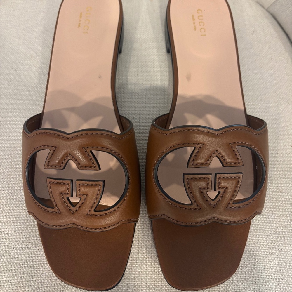 Gucci women’s slide sandal with interlocking G